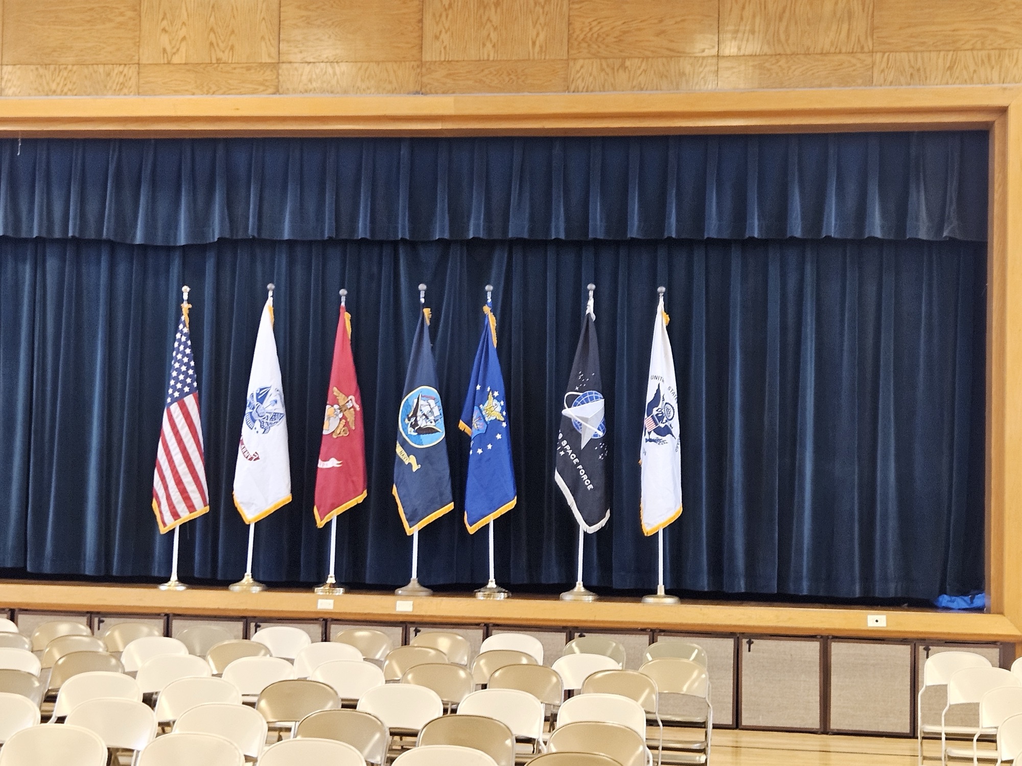 Service flags displayed on a stage